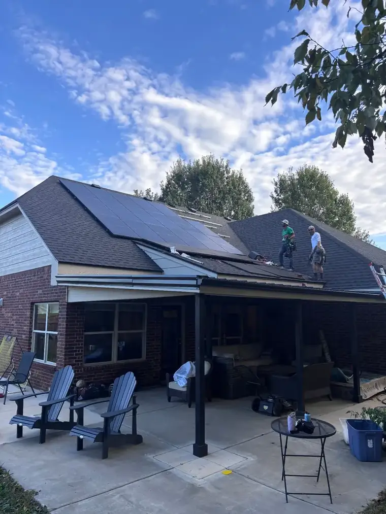 Reroofing around an existing solar array without disturbing the panels — Bartlesville Roofing & Gutters, Bartlesville OK