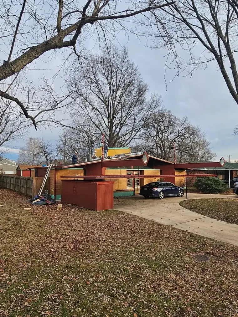 Winter tear-off on one of Bartlesville's mid-century modern homes — Bartlesville Roofing & Gutters, Bartlesville OK